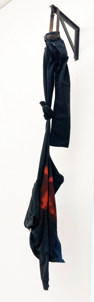 K-22.2 (Clothes hook), 2022 • steele angle, screws, trousers, belt, jacket, 240 x 38 x 45 cm